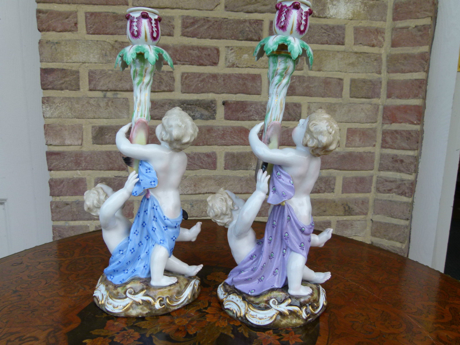 A pair Meissen porcelein candelabra.