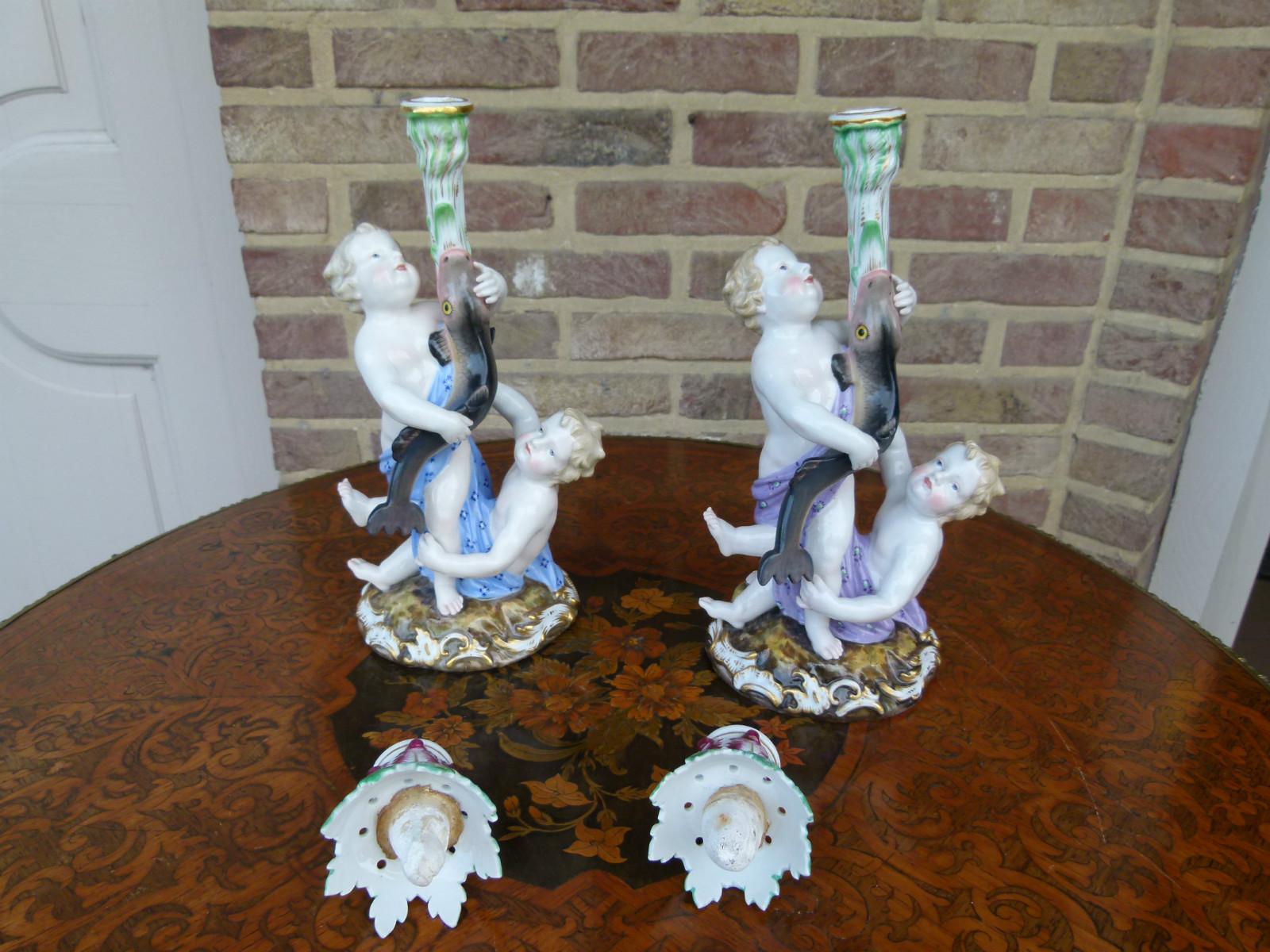 A pair Meissen porcelein candelabra.