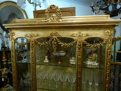 Louis 16 style display cabinet in gilded wood and plaster, France 1880