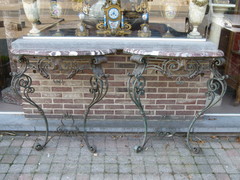 style A pair wrought iron consoles with marble top in iron and marble, France 1900-1920