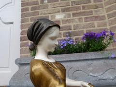 A young lady feeding chicks style Sculpture with ivory by Henryk II Kossowski in gilded and patinated bronze with ivory, Poland 1900