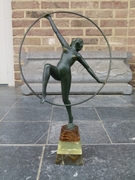 Art-deco style Sculpture of a dancing girl by E.Urbain in green patinated bronze on a tri-color onyx base, France 1930