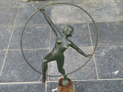 Art-deco style Sculpture of a dancing girl by E.Urbain in green patinated bronze on a tri-color onyx base, France 1930