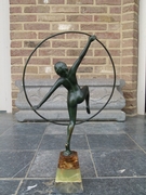 Art-deco style Sculpture of a dancing girl by E.Urbain in green patinated bronze on a tri-color onyx base, France 1930