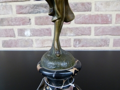 Art-deco style Sculpture of a oriental dancing lady by Omerth  in patinated bronze on marble base, France 1925