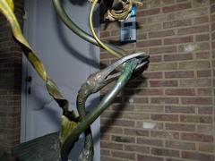 Art-nouveau style patinated bronze lamp with a bird in patinated bronze, France 1900