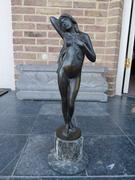 Art-nouveau style Sculpture of a naked lady by C. Maerlin in patinated bronze with foundry stamp and marble base, Germany 1900