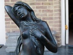 Art-nouveau style Sculpture of a naked lady by C. Maerlin in patinated bronze with foundry stamp and marble base, Germany 1900