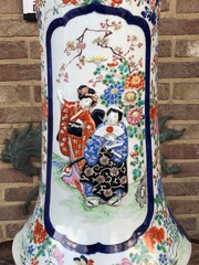 Asiatique style Japanese vase with scene in relief in porcelain, Japan 1900