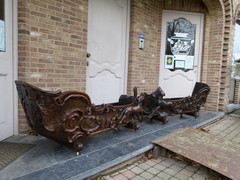 Barock style A sleigh transformed to a pair flower pots with dogs in carved wood, probably Germany 1770