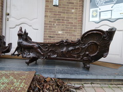 Barock style A sleigh transformed to a pair flower pots with dogs in carved wood, probably Germany 1770