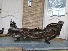 Barock style A sleigh transformed to a pair flower pots with dogs in carved wood, probably Germany 1770