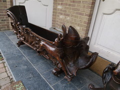 Barock style A sleigh transformed to a pair flower pots with dogs in carved wood, probably Germany 1770