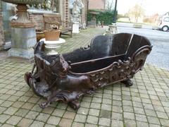 Barock style A sleigh transformed to a pair flower pots with dogs in carved wood, probably Germany 1770