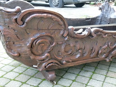 Barock style A sleigh transformed to a pair flower pots with dogs in carved wood, probably Germany 1770