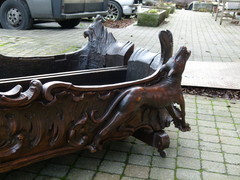 Barock style A sleigh transformed to a pair flower pots with dogs in carved wood, probably Germany 1770