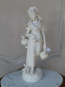 Bell epoque style Sculpture  of a farmer lady signed by Comein in bisquit, France 1900