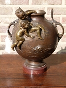 Belle epoque style bronze vase with putto,s on red marble base in patinated bronze, France 1890