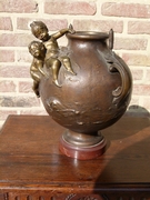 Belle epoque style bronze vase with putto,s on red marble base in patinated bronze, France 1890