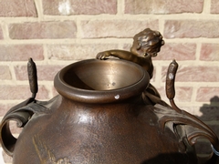 Belle epoque style bronze vase with putto,s on red marble base in patinated bronze, France 1890