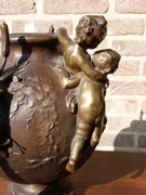 Belle epoque style bronze vase with putto,s on red marble base in patinated bronze, France 1890