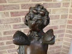 Belle epoque, style Sculpture of a putto in patinated bronze, France 1880,unsigned probaply Moreau