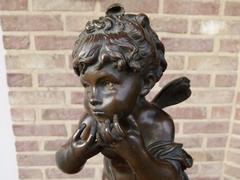 Belle epoque, style Sculpture of a putto in patinated bronze, France 1880,unsigned probaply Moreau