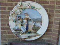 Belle epque style Huge porcelain plate with a romantic scene in faience porcelain, probably Germany 1920