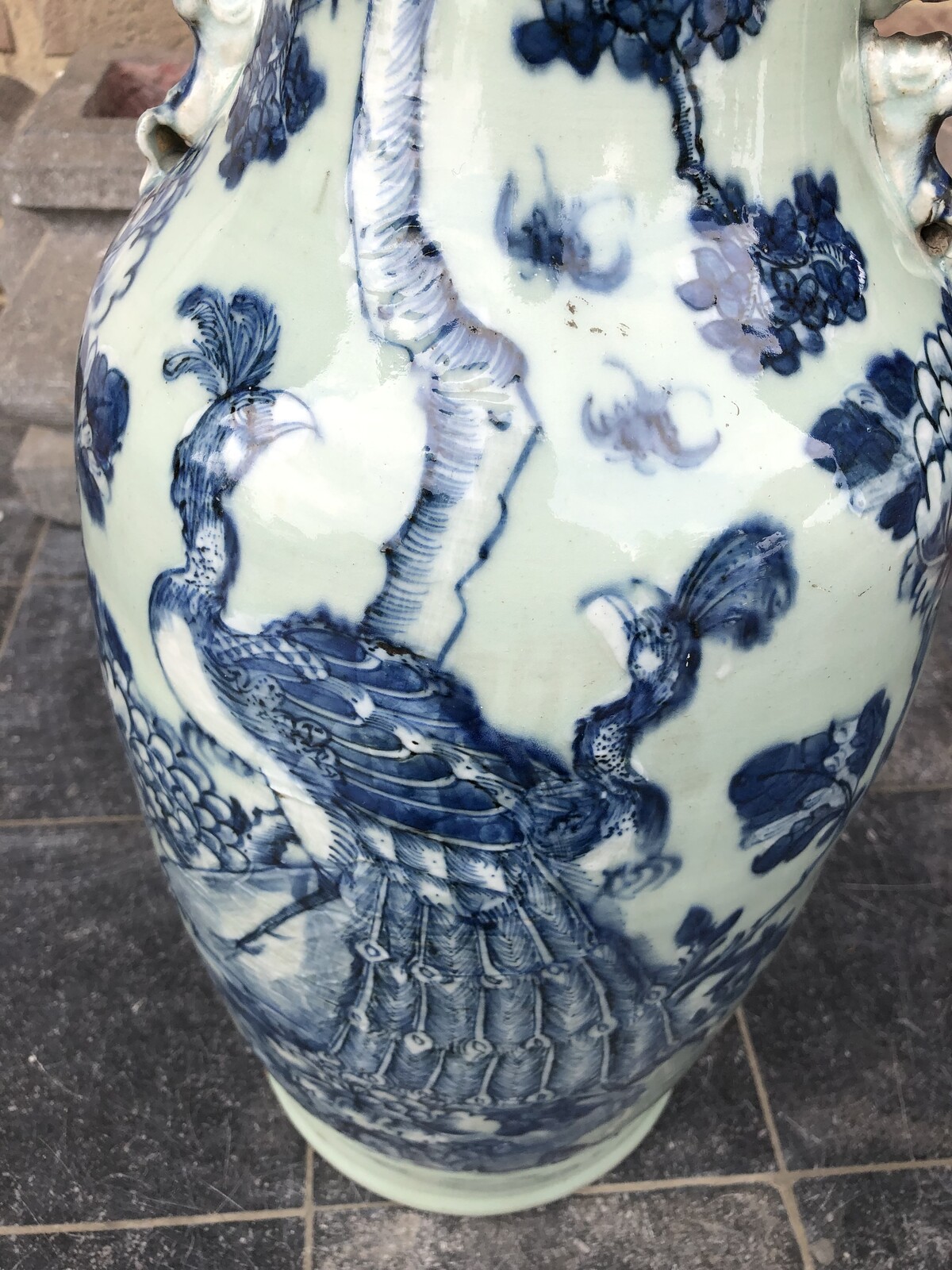 Chinese celadon vase with a peacock