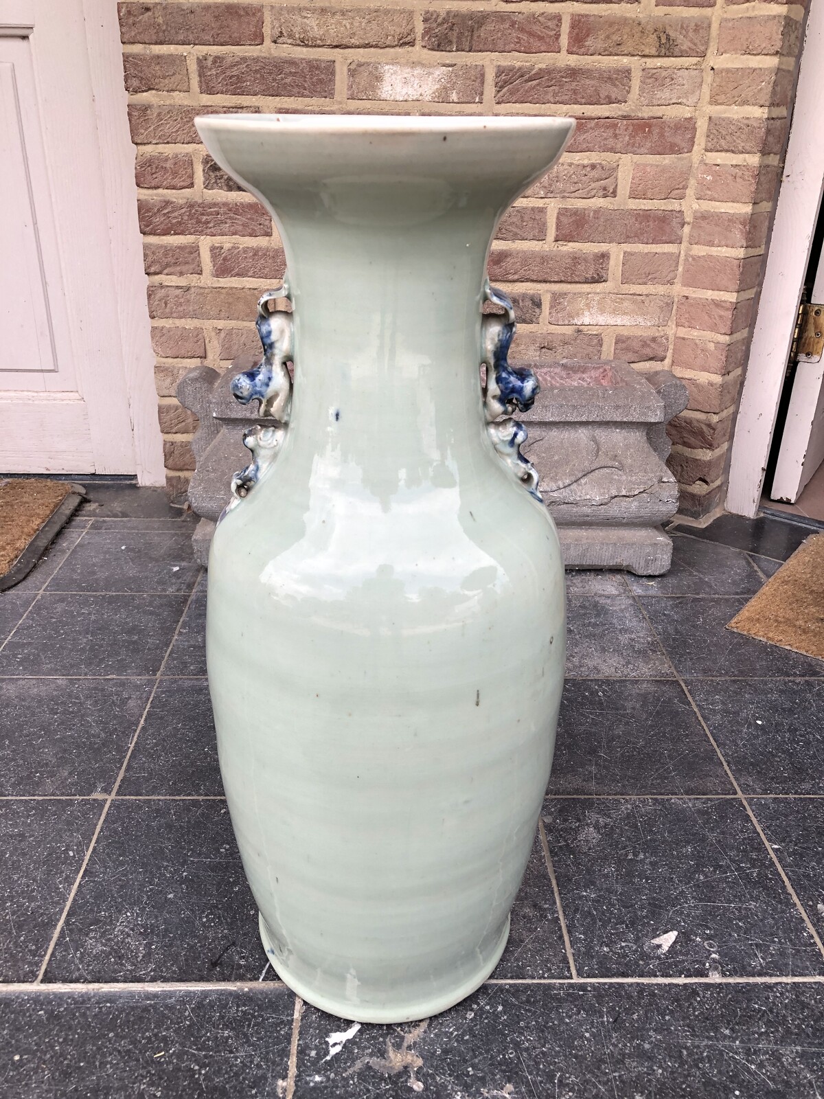 Chinese celadon vase with a peacock