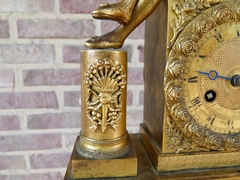 Empire style Clock pendule  in gilt bronze, France 1820