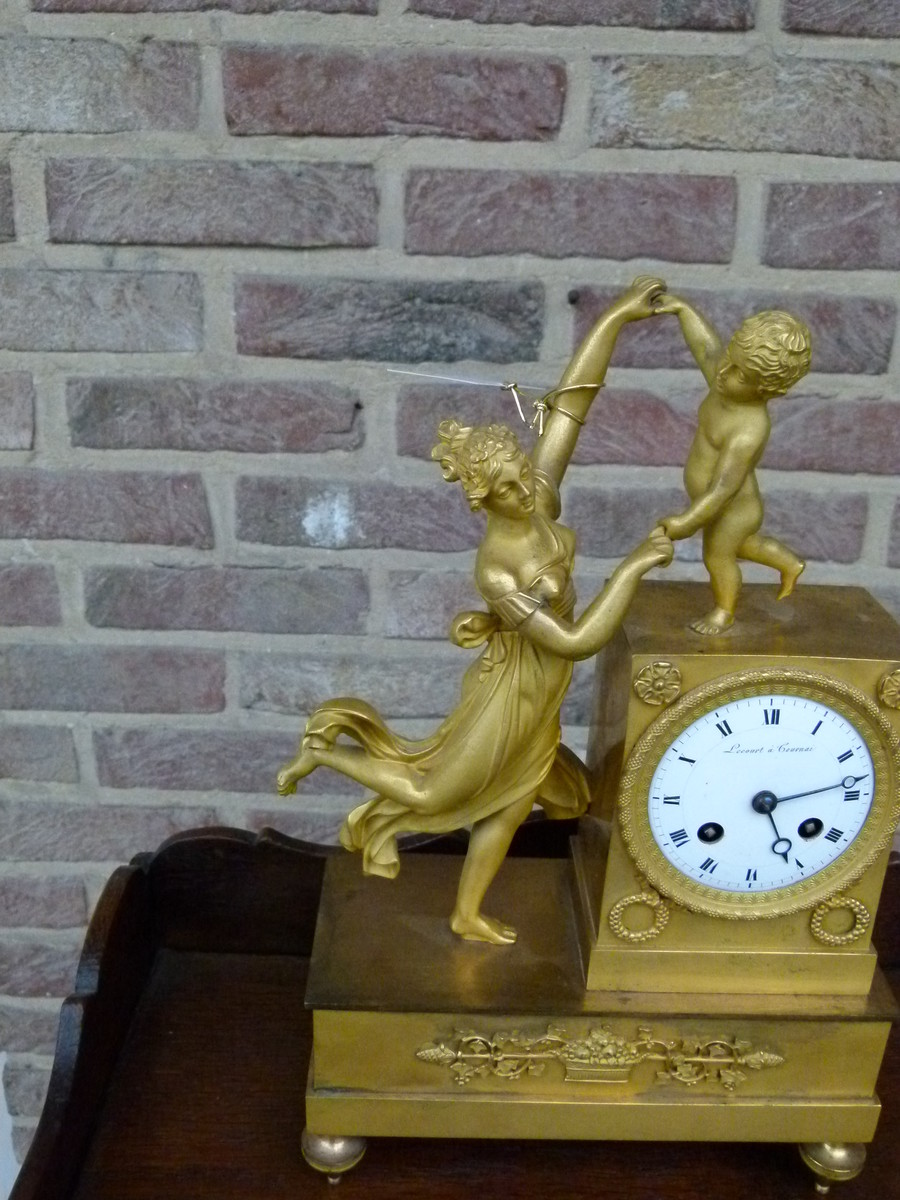 Empire Miniature pendule clock with a lady and child