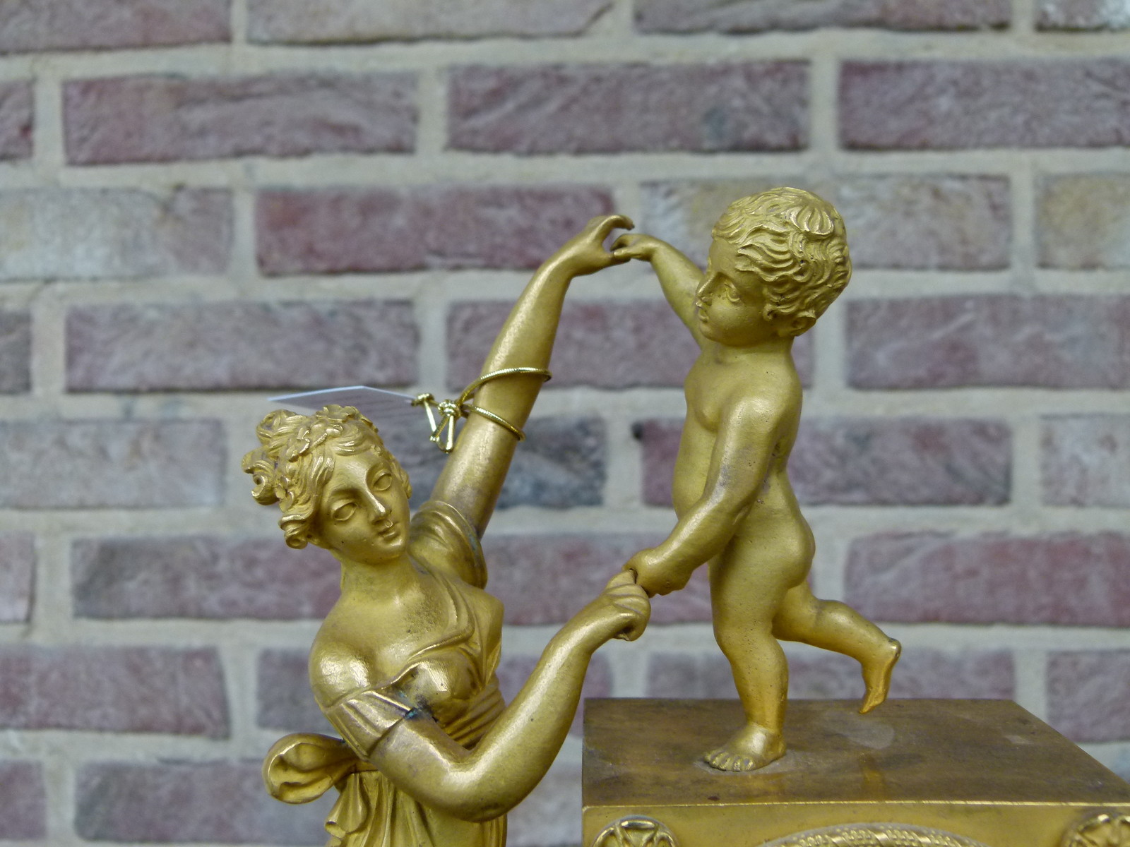 Empire Miniature pendule clock with a lady and child