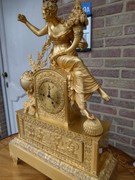 Empire/Restoration style Pendule with a lady in gilded bronze, France 1830