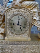 Empire/Restoration style Pendule with a lady in gilded bronze, France 1830