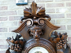 Hunting style Barometer with animals and fruits in carved oak, France 1890