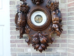 Hunting style Barometer with animals and fruits in carved oak, France 1890