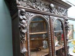 Hunting style Bookcase in carved oak, France 1880