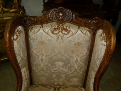 Louis 15 style Bergére armchair with nice quality carving in walnut, Belgium 1920