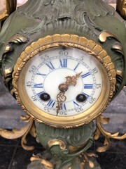 Louis 15 style Clockset in patinated and gilded bronze, France 1900