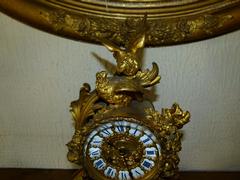 Louis 15 style Clockset in gilded bronze 