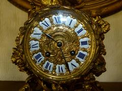 Louis 15 style Clockset in gilded bronze 