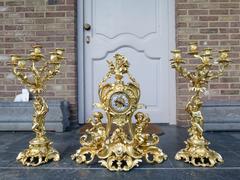 Louis 15 style Clockset with putti,s Napoleon 3  in gilded bronze, France 1880