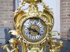 Louis 15 style Clockset with putti,s Napoleon 3  in gilded bronze, France 1880