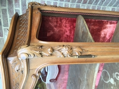 Louis 15 style Display cabinet with curved glass in carved wallnut, France 1880