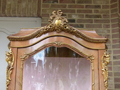 Louis 15 style Display cabinet with flower marquetry and gilded bronzes in different woods, France 1930