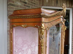 Louis 15 style Display cabinet with flower marquetry and gilded bronzes in different woods, France 1930