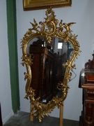 Louis 15 style Gilded mirror with putto,s in gilded wood and plaster, France 1870