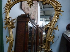 Louis 15 style Gilded mirror with putto,s in gilded wood and plaster, France 1870