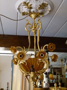 Louis 15 style Lamp with 3 putti,s and brown glass shapes in gilded and patinated bronze, Belgium 1920